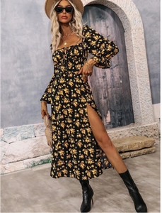 Detail of square neckline with lace-up string on black floral bohemian long sleeve dress