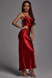 Close-up of deep red satin backless dress showing smooth texture and metallic luster