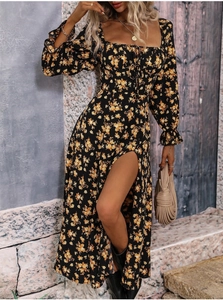 Detail of bohemian floral dress showing elastic ruffled cuffs and square neckline