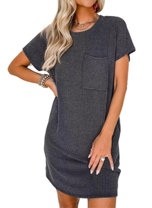 Close-up of women's short sleeve waffle knit dress featuring textured fabric and chest pocket