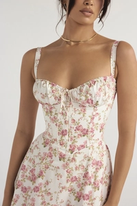 Detail of floral sundress featuring a sweetheart neckline and corset bodice
