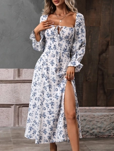 Detail of square neckline with drawstring and elastic ruffled long sleeves on floral dress
