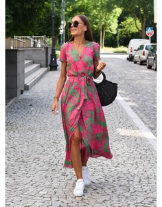 Detail of pink and green floral maxi dress with V-neck, waist drawstring and side slit