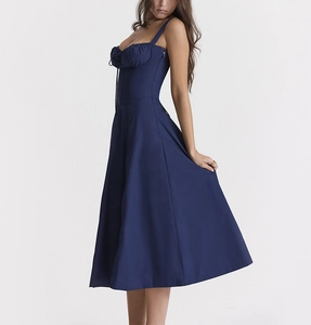 Detail view of the deep blue floral corset dress with side zipper and lace-up back