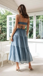 Detail of light blue backless tie-up top and layered tiered skirt in bohemian style