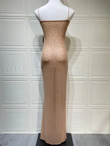 Detail of nude mermaid gown with shimmering silver sequins and sleek spaghetti straps