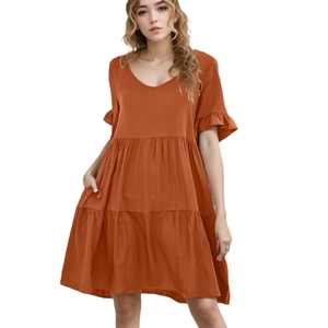 Burnt orange tiered summer mini dress with V-neckline and short sleeves for casual wear