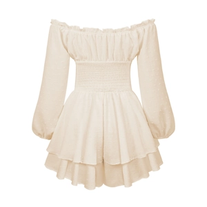 Detail of smocked waist and tiered ruffle hem on cream off-shoulder romper dress