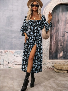 Long sleeve bohemian dress in black with light blue floral print and side slit detail