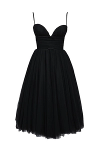 Detail of elegant black pleated tulle dress with slim straps and heart-shaped neckline