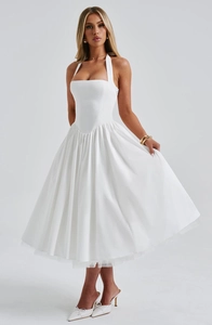 Detail of white halter neck dress with structured bodice and voluminous satin A-line skirt