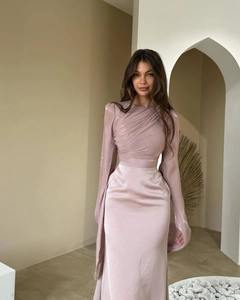 Detail of cross-pleated bodice and satin fabric on a mauve slim-fit evening gown