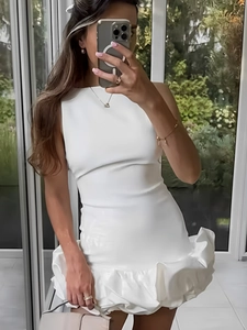 Elegant white sleeveless mini dress with tiered ruffle hem and slim fit for party events