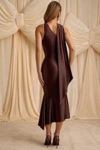 Detail view of the chocolate satin evening gown featuring an elegant fish-tail hemline
