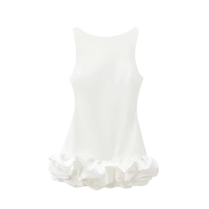 Close-up of sleek white sleeveless mini dress featuring a voluminous tiered ruffle hemline