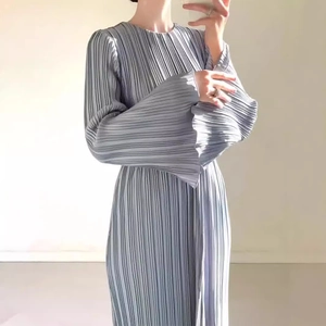Elegant light blue pleated midi dress with flared sleeves and minimalist crew neck style