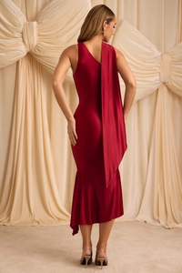Detail of burgundy satin evening dress showing the elegant backless design and long neck tie