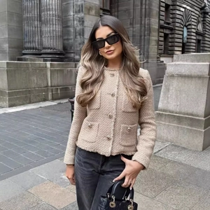 Classic beige tweed jacket for women featuring vintage gold buttons and four front pockets