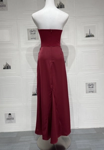 Detailed back view of a burgundy satin off-shoulder long dress with a hidden zipper