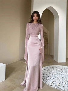 Elegant dusty pink satin long-sleeve evening dress with waist pleats and floor-length hem