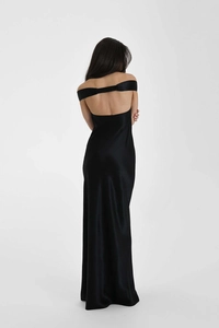 Detail of elegant backless satin evening gown with wide strap lacing for a refined fit