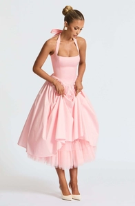 Detailed view of pink halter dress featuring multi-layer mesh tutu and waist tie