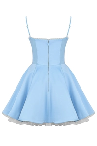Detail of light blue satin mini dress with white lace trim and puffy mesh underskirt
