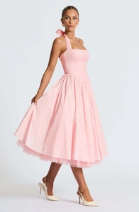 Detail of light pink halter midi dress featuring a voluminous pleated mesh hem and waist tie