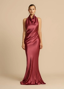 Detailed view of elegant wine red satin halter dress with draped waist and silky texture