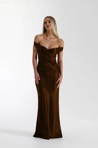 Detail of elegant off-the-shoulder neckline and chocolate brown satin fabric on evening dress