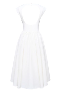 Detailed view of the elegant open back U-shape design on the white sleeveless dress