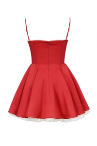 Detail view of red satin mini dress with thin straps, waist seam and concealed back zipper