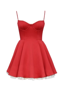 Detailed close-up of red satin mini dress with white lace trim and layered mesh hemline