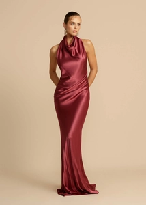 Close-up of wine red satin cowl neck dress showcasing elegant fabric drape and metallic luster