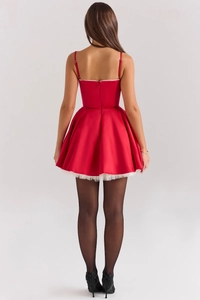 Detailed back view of a red satin mini dress with white lace trim and slim fit waist