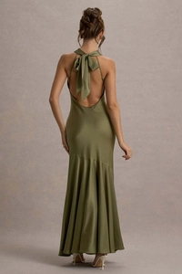 Detailed back view of olive green satin dress with an elegant oversized neck bow