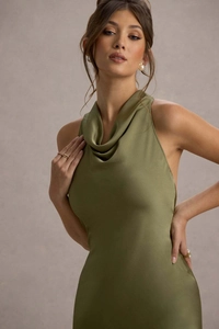 Detail of elegant olive green cowl neck satin fishtail dress with glossy texture