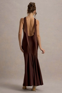 Close-up of the open-back detail and long ribbon ties on a chocolate satin mermaid dress
