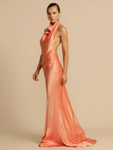 Elegant coral pink satin halter neck backless midi dress with draped cowl neckline
