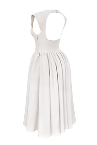 Detail view of backless sleeveless dress featuring elegant pleats and hidden side zipper