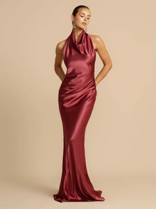 Elegant burgundy satin halter neck dress featuring a backless slit and slim fit silhouette
