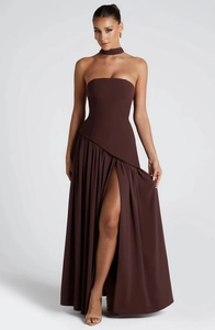 Detail of deep brown strapless high-slit gown with pleated waist and matching neckpiece