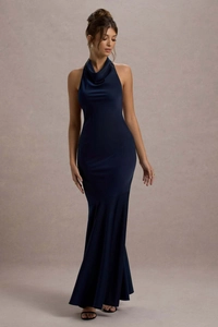 Detailed close-up of navy blue mermaid evening gown with cowl neck and satin finish