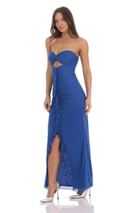 Close-up of royal blue strapless evening dress featuring elegant cutout and ruffle detail