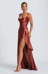Detail of elegant satin evening dress with cowl neck and side draping texture