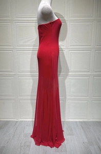 Detail of red tube top dress with side zipper closure and tiered mesh tulle skirt design