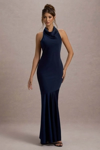 Detail of elegant navy blue fishtail dress featuring a halter neck and draped satin finish