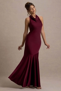Close-up of the elegant cowl neck design and smooth satin fabric of the burgundy dress