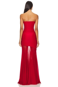 Detailed back view of a red strapless bodycon dress featuring a sheer layered mesh hemline