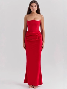 Elegant red strapless corset maxi dress with structured bodice and draped satin details